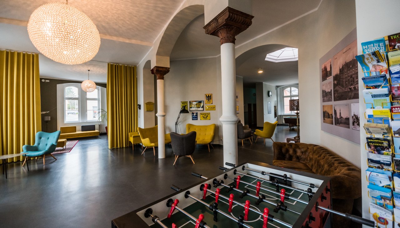 Gemeenschappelijke lobby met tafelvoetbal en zitjes, © Robert Vorwieger (Postel Usedom GMbH) Gemeenschappelijke lobby met tafelvoetbal en zitjes, © Robert Vorwieger (Postel Usedom GMbH)