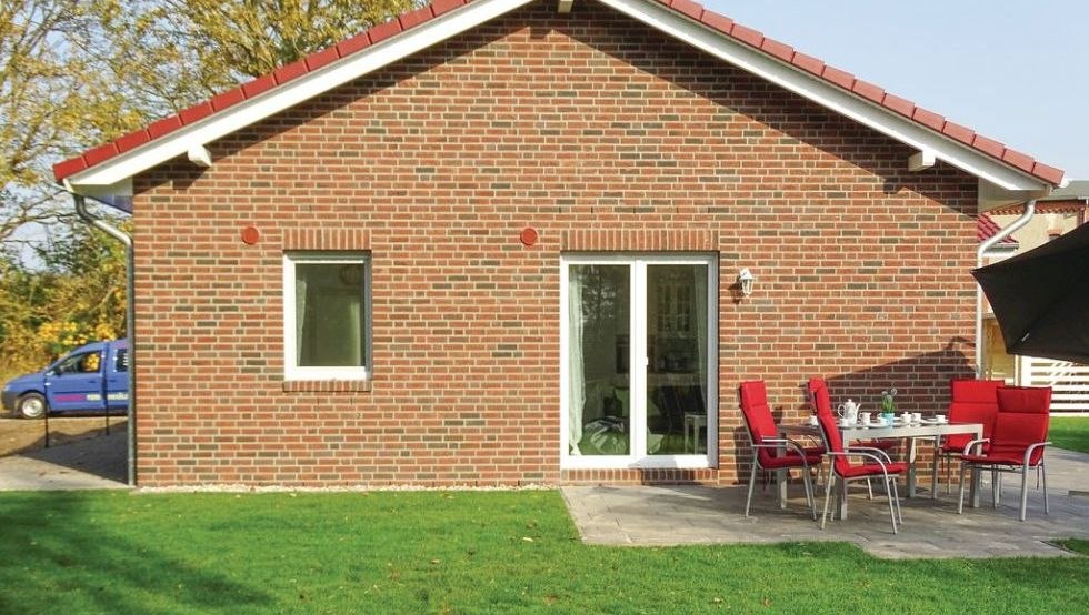 De ruime en omheinde tuin van het vakantiehuis in Boiensdorf, © @cramer
