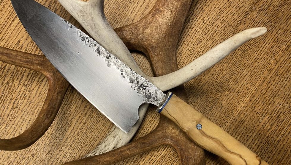 Carbon steel chef's knife with olive wood handle, © Richard Lehmann