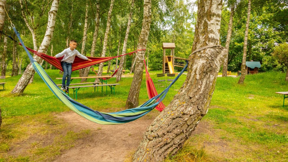 Biertuin bij Hotel Ostseeland met kinderspeelplaats en ligweide, © Hotel Ostseeland