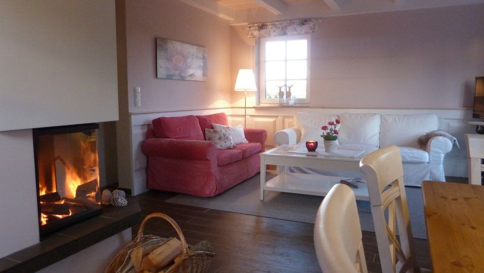 Living room with fireplace, &copy; Ferienh&auml;user Salzhaff-Romantik