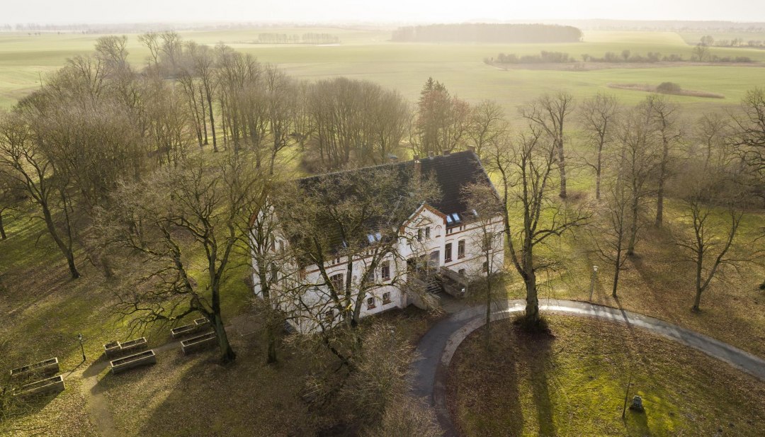 Zonsondergang over het landhuis Zarchlin