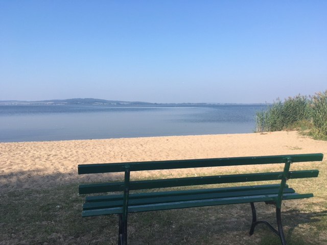 Bank bij zonsondergang, © Groh