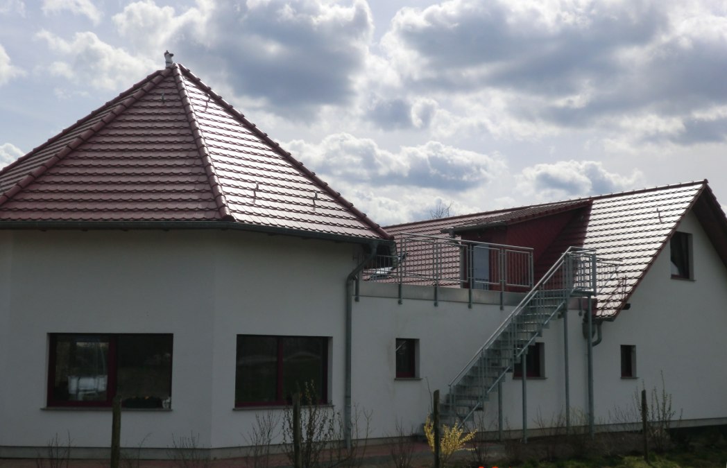 Het huis met de vakantiewoning op de bovenverdieping, © Burkhard Müller