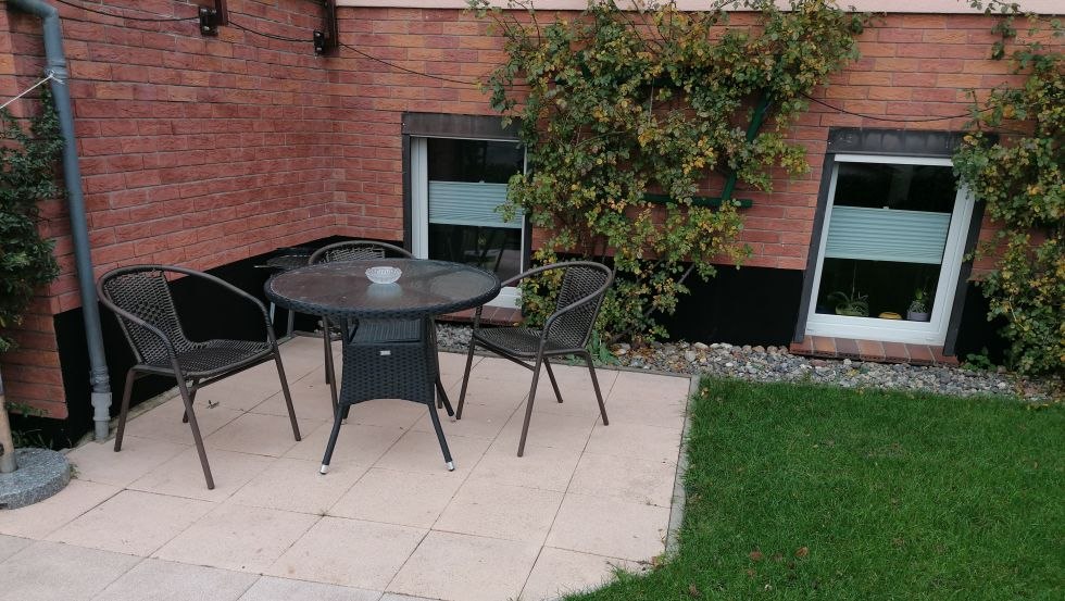 Sitting area in the garden of the vacation apartment Kröpelin, © Günter Schubert Sitting area in the garden of the vacation apartment Kröpelin, © Günter Schubert