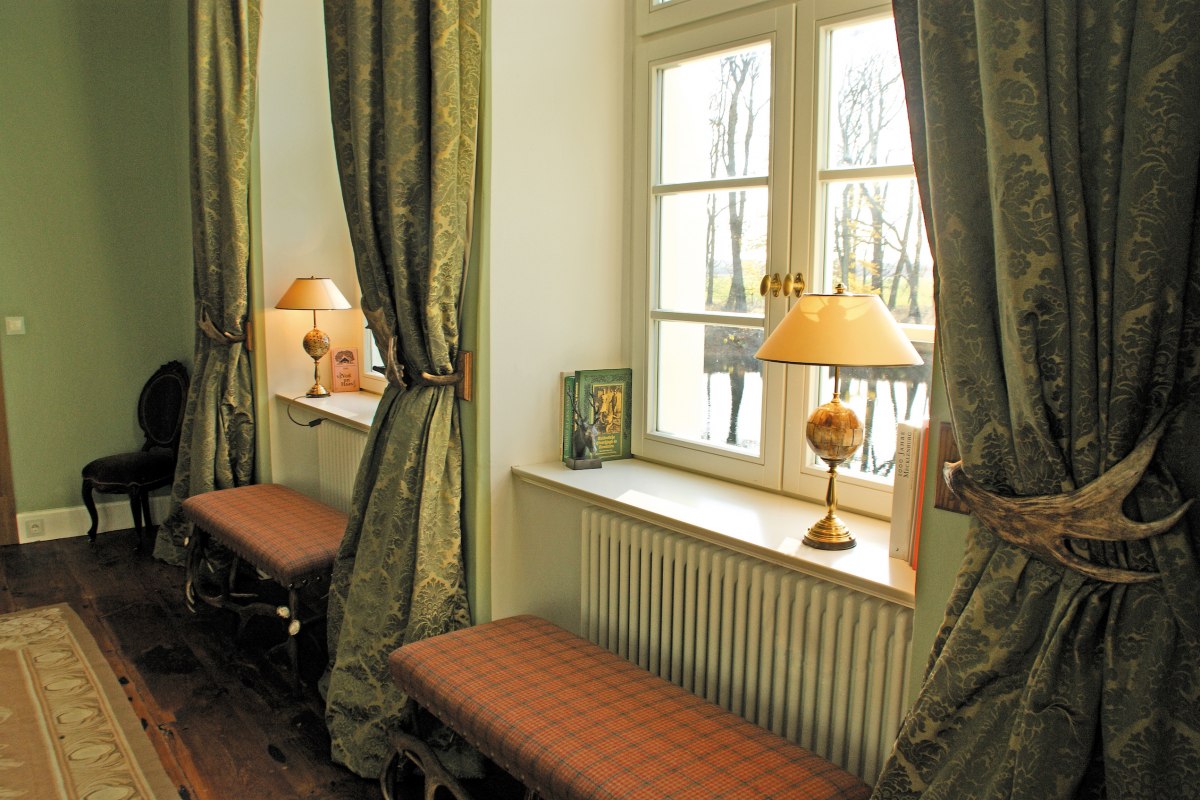 Groene salon in Kotelow Hunting Lodge // &copy; Jagdschloss Kotelow