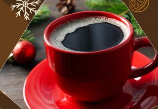 Red mug with coffee with a Christmas background and graphic elements, © Zoo Schwerin Red mug with coffee with a Christmas background and graphic elements, © Zoo Schwerin