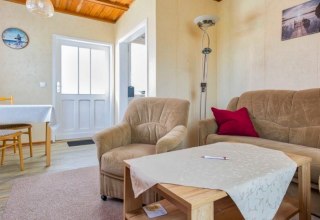 Bright and friendly living rooms, with TV. // &copy; Fam. Schurat