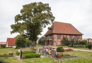 the chapel Zepelin with lime tree and cemetery, © Frank Burger