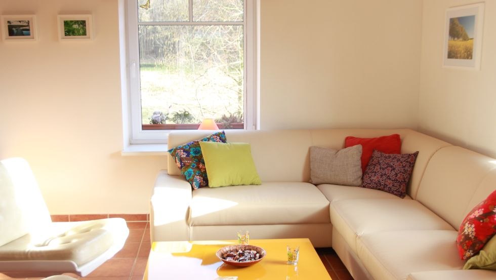 Living area with couch in house Nele // © MITourA GmbH Living area with couch in house Nele // © MITourA GmbH