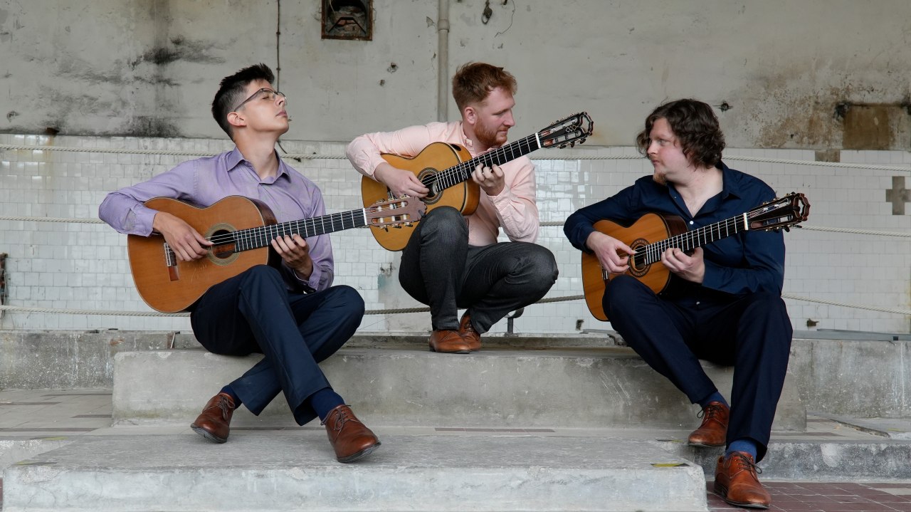 three musicians of the Tritonus Guitar Trio from Hungary with their instruments // &copy; Tritonus Guitar Trio