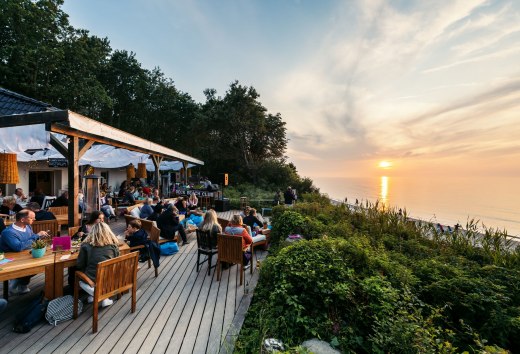 Zachód słońca w Deck Beach Club w Heiligendamm nad Morzem Bałtyckim, © TMV/Tiemann