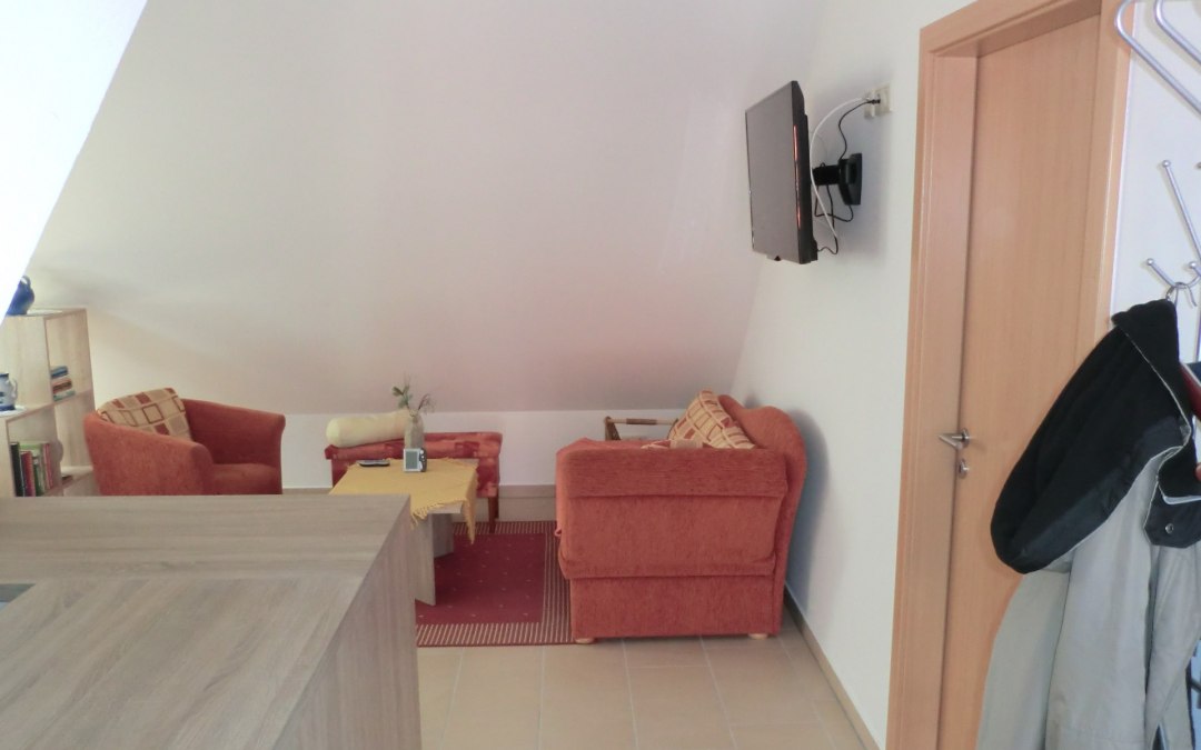 View from the entrance to the living area with TV, © Burkhard Müller
