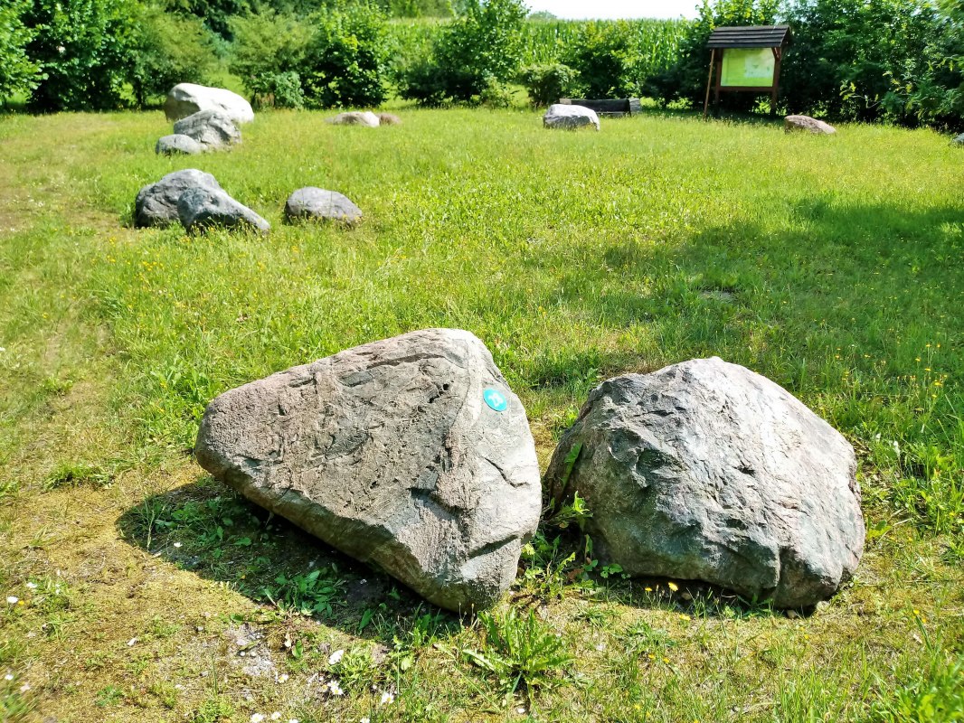 There are 32 boulders (currently) in the garden. There are numbers on the stones and a plaque tells you what kind of stone it is based on the number. // &copy; Wolfgang Mamat