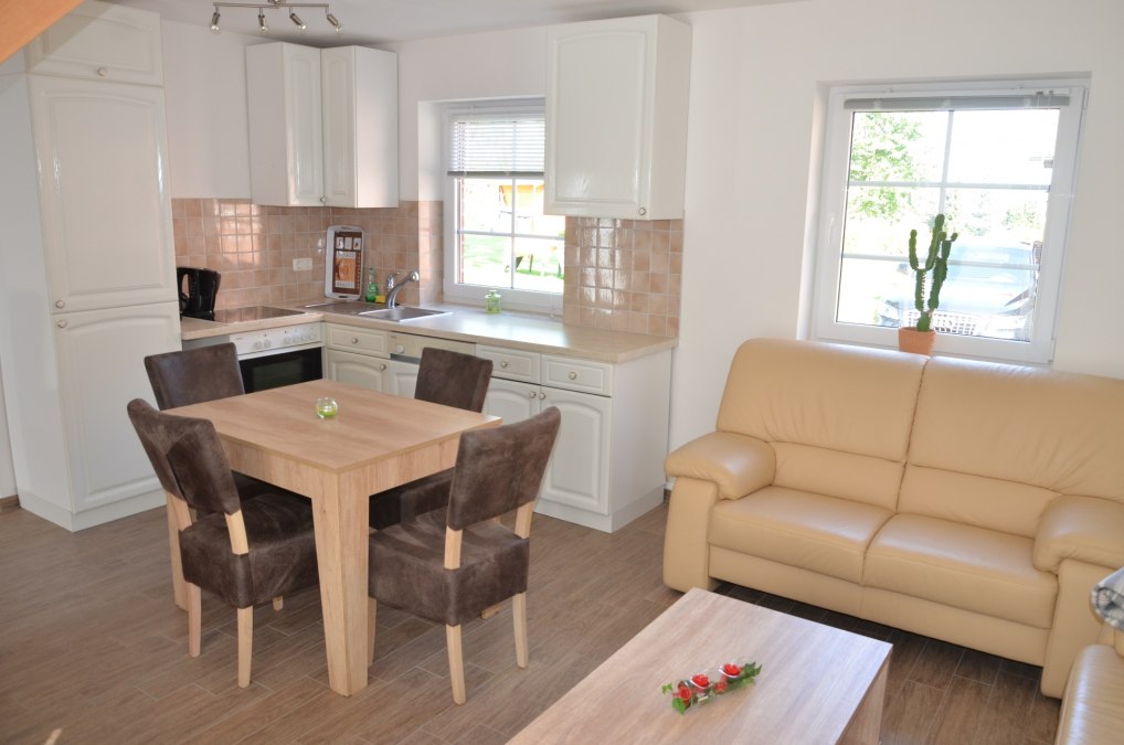 Zicht in een woonkamer van het nieuwe vakantiehuis, © Falkenberg
