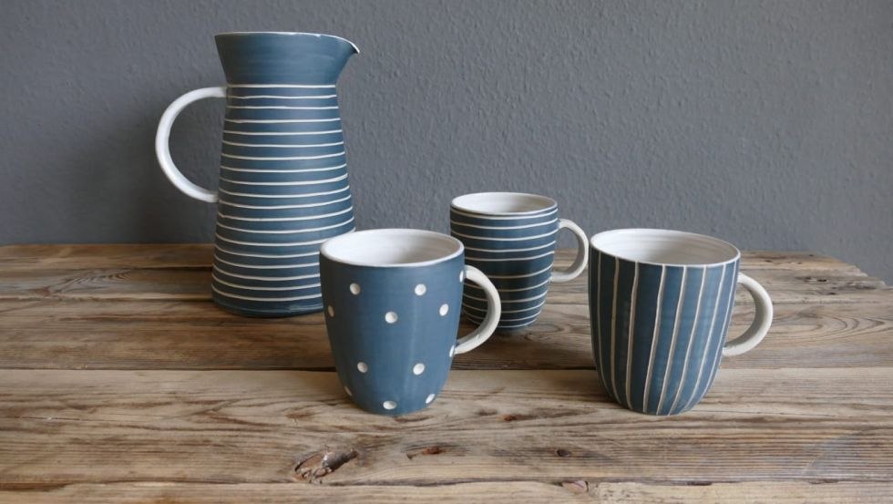 Pitcher and cups, engobed and carved (electric firing), © Judith Renz