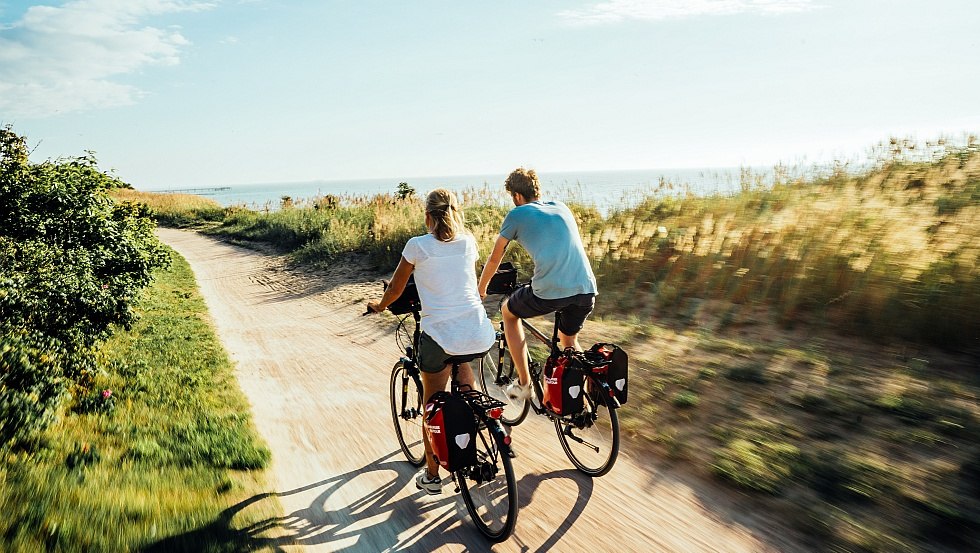 A couple cycling along the cliffs near the Baltic seaside resort of Wustrow Fischland-Dar&szlig;-Zingst