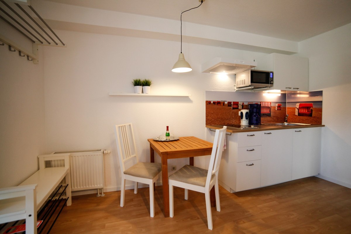 Kapitein Pahlen Ferienanlage - Terras flat kitchenette, &copy; Captain Pahlen Ferienanlage