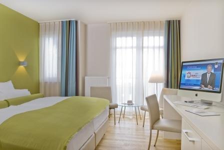 Tweepersoonskamer, © nymphe strandhotel & apartments GmbH & Co. KG