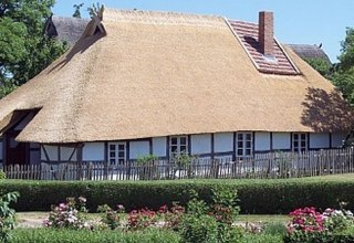 Reetdachkate in Klocksdorf im Sommer // © Ferien in der Reetdachkate/Koop Reetdachkate in Klocksdorf im Sommer // © Ferien in der Reetdachkate/Koop