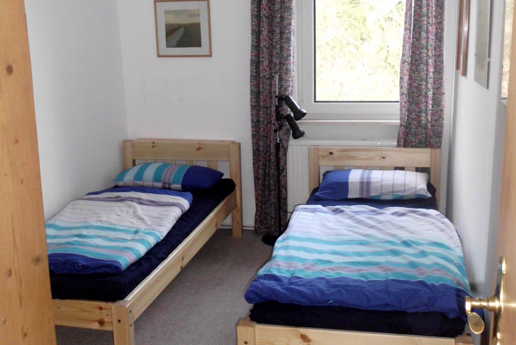 Kamer met twee eenpersoonsbedden, © Elisabeth Tuschy