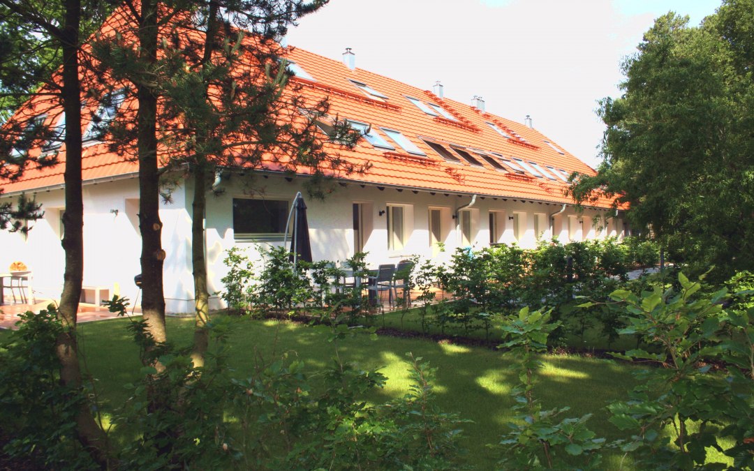 Haus Düne31 AppartementenhuisBuitenzicht met tuin en terrassen, © Haus Düne31