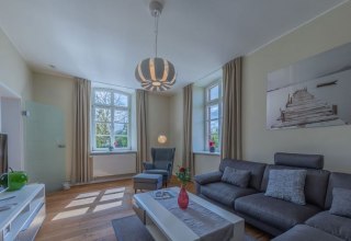 Wohnzimmer der Ferienwohnung Schmiede in Blücherhof // © Andre Pretzel Wohnzimmer der Ferienwohnung Schmiede in Blücherhof // © Andre Pretzel