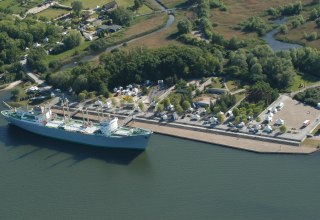 Aerial view of the harbor promenade of the FLAIR AM MEER // &copy; inRostock