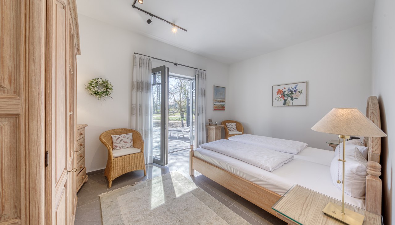 Bedroom with double bed and terrace access, © André Pretzel Bedroom with double bed and terrace access, © André Pretzel