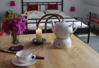 W tym wakacyjnym mieszkaniu można poczuć się jak w domu, jest przytulne i zachęca do odpoczynku, © Gesundhaus Klatschmohn/Wendt