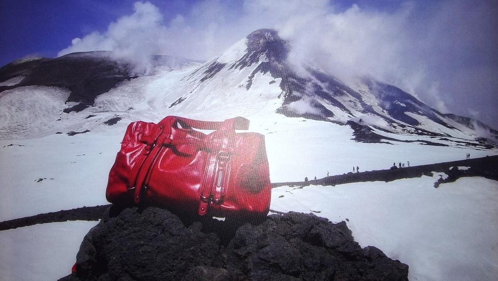 Red bag in front of Mount Etna in Sicily, &copy; Heike Melzer