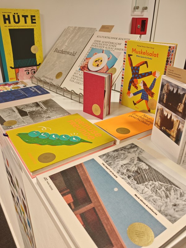 several books displayed on a white shelf, &copy; Stadtbibliothek Stralsund