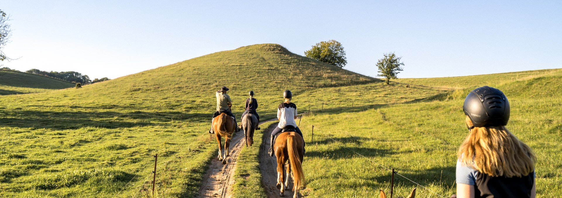 Riding out in the Recknitz valley at sunrise - with green hills