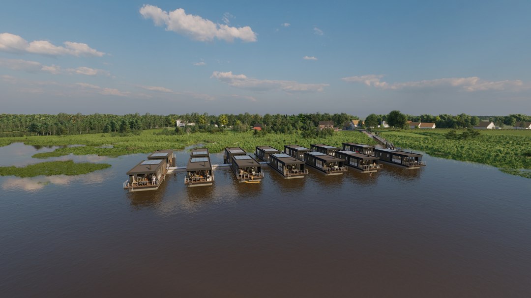 View of the jetty of the Fuhlendorf harbor resort with the floating vacation homes directly on the Bodstedter Bodden - maritime ambience and vacation in an exclusive location., &copy; Hafenresort Fuhlendorf / FHG floating house GmbH