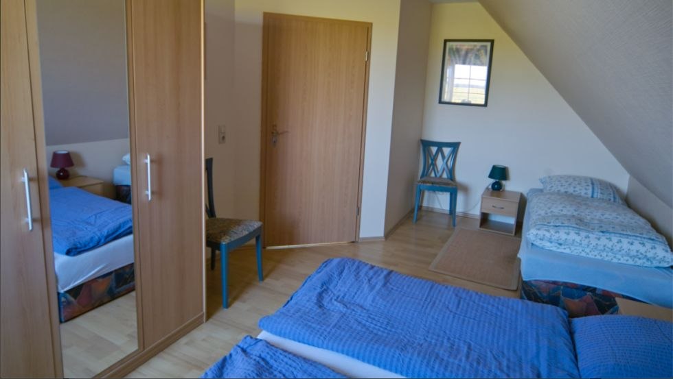 Slaapkamer in de vakantiewoning Küchenmeister, © Bernd Küchenmeister