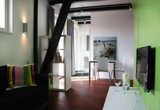2-Personen Apartment "Die Verträumte"Galeriewohnung | 40 m² | Wohnraum mit Küche | 1 Schlafraum | Dusche | Terrasse // © Haus Düne31 2-Personen Apartment "Die Verträumte"Galeriewohnung | 40 m² | Wohnraum mit Küche | 1 Schlafraum | Dusche | Terrasse // © Haus Düne31