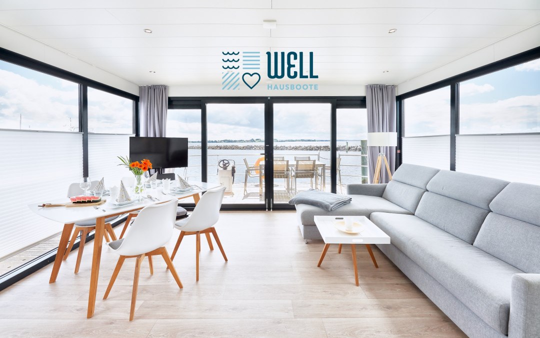 Houseboat interior living / dining room with large sliding door to the bow terrace, © Lars Franzen