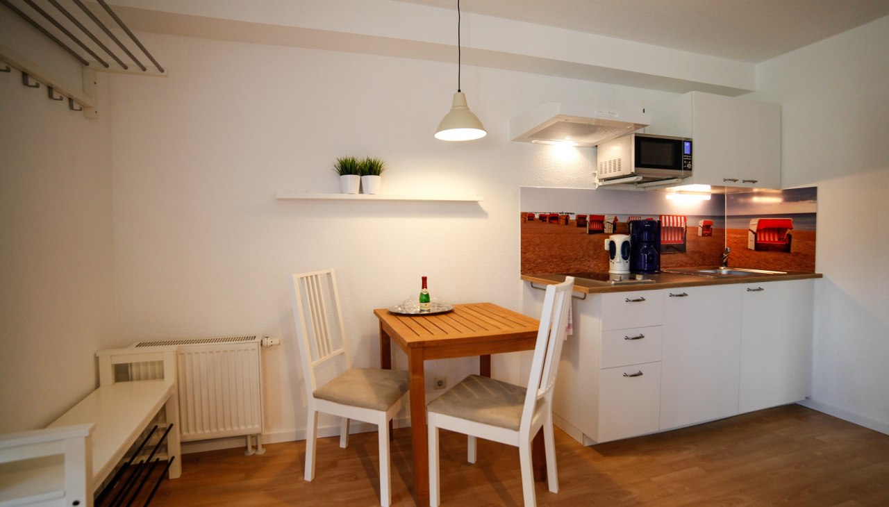 Kapitein Pahlen Ferienanlage - Terras flat kitchenette, &copy; Captain Pahlen Ferienanlage