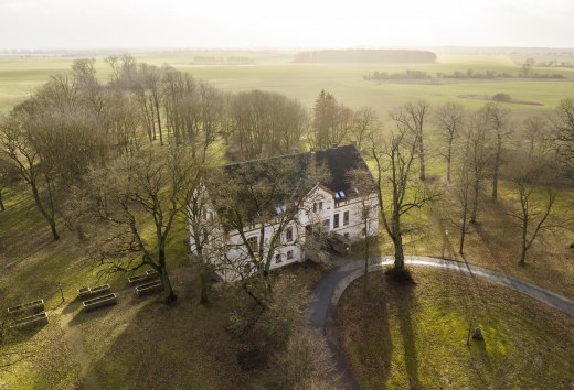 Zonsondergang over het landhuis Zarchlin