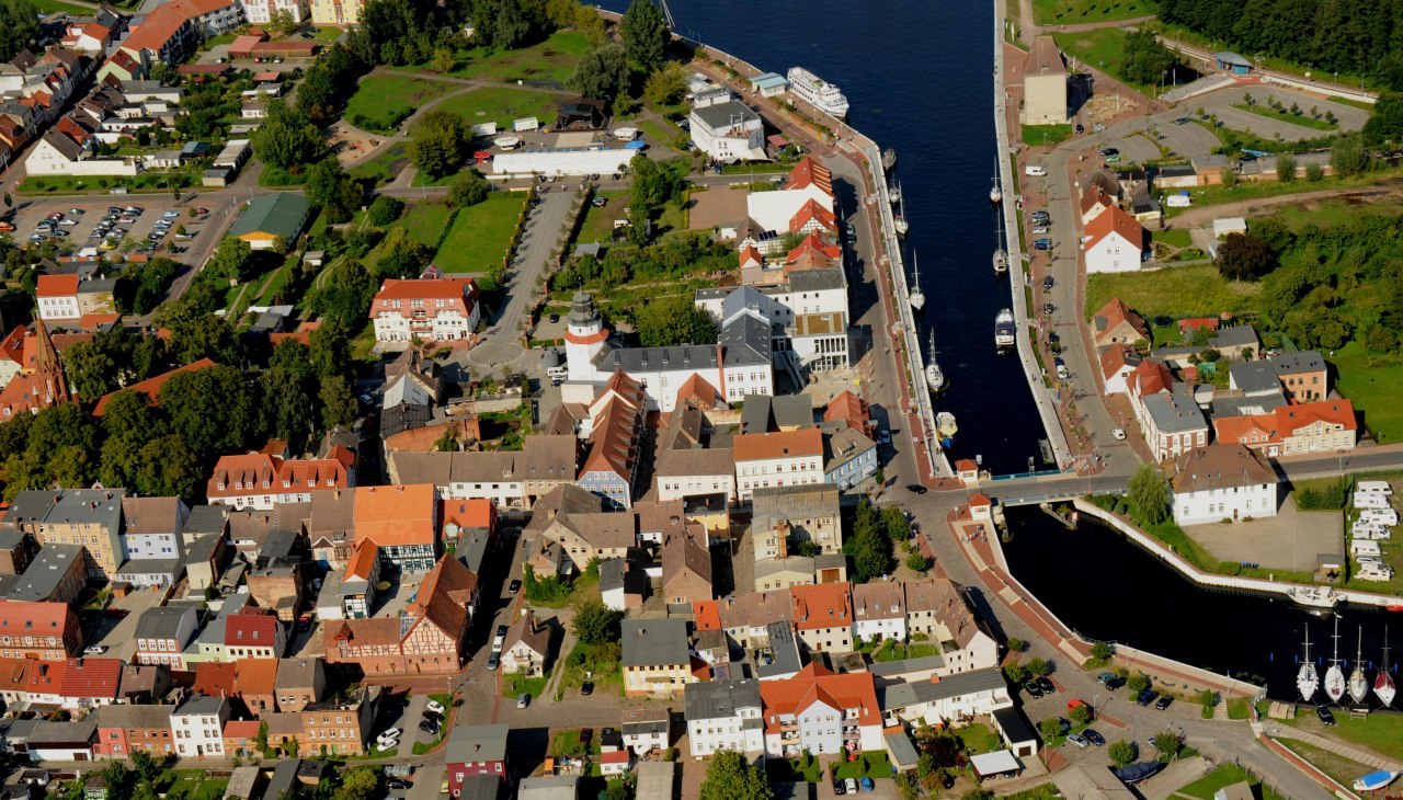 Seaside resort Ueckermünde harbour with an open bascule bridge across the river Uecker, © Walter Graupner