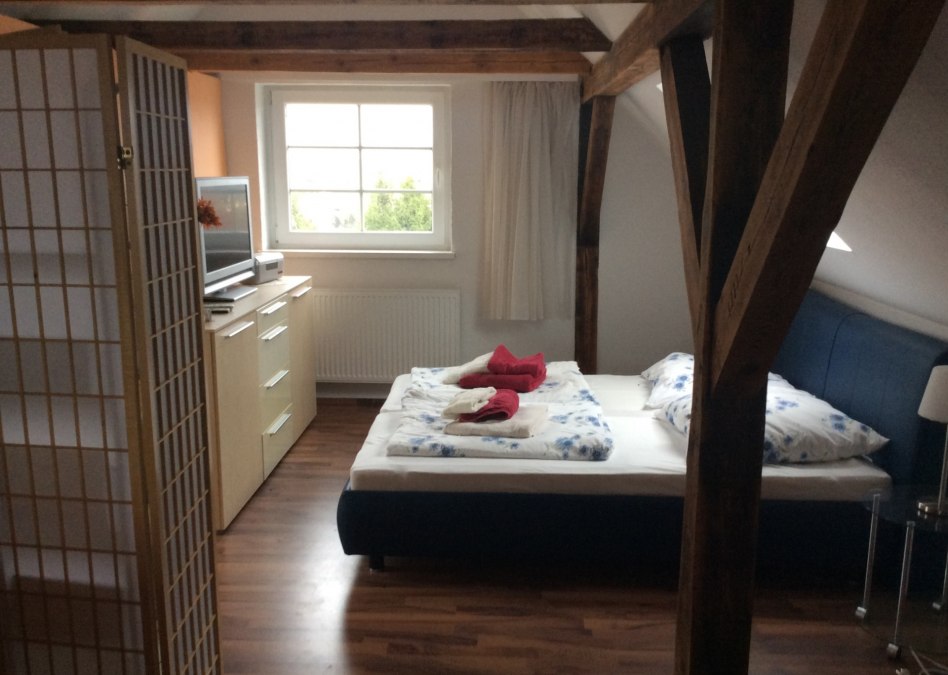 The bedroom of the apartment on the upper floor, © Johanna Manthey