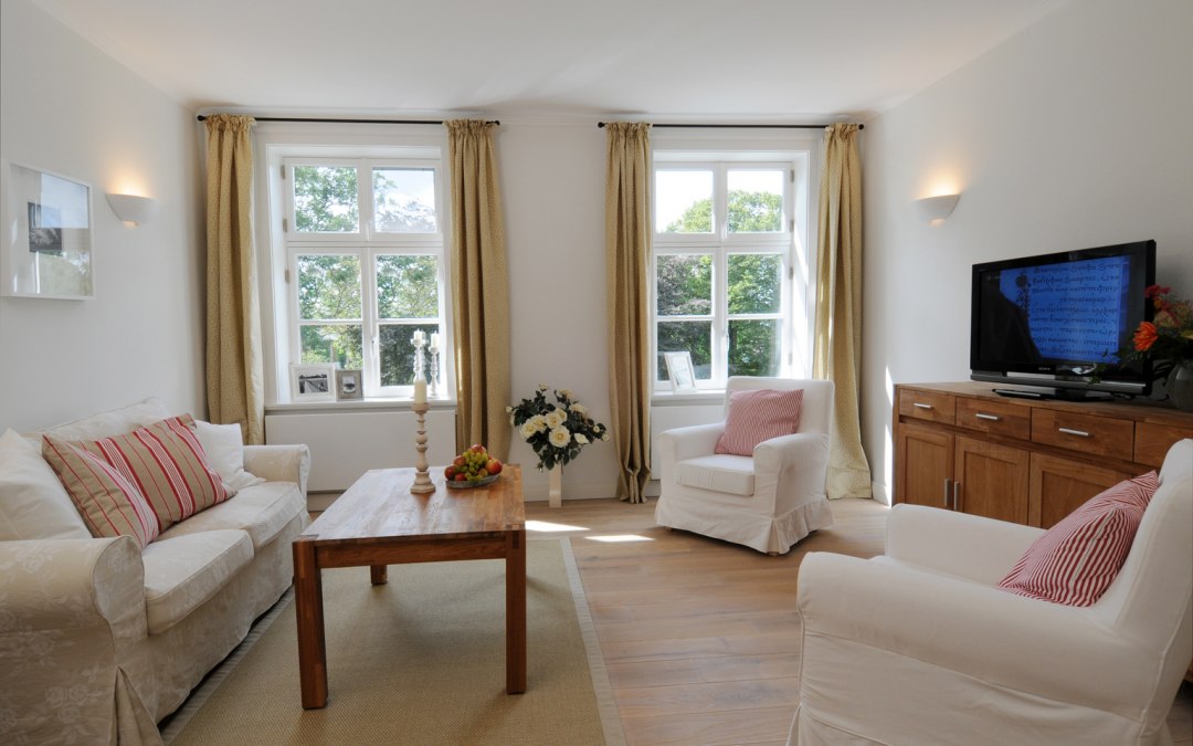 Appartement met woonkamer in het landhuis Zicker, © Gutshaus Zicker