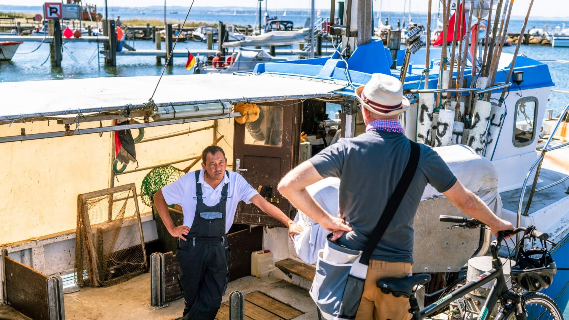 Talking shop with the fishermen of Poel, &copy; TMV/Tiemann