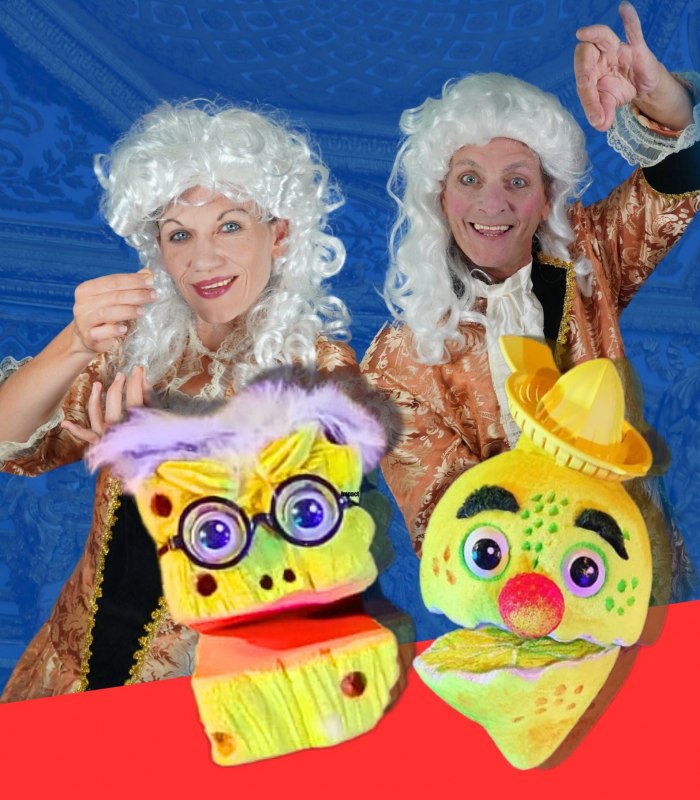 A woman and a man in imperial costumes and a white baroque wig hold up non-transparent clothing. // &copy; Theater Phoebus