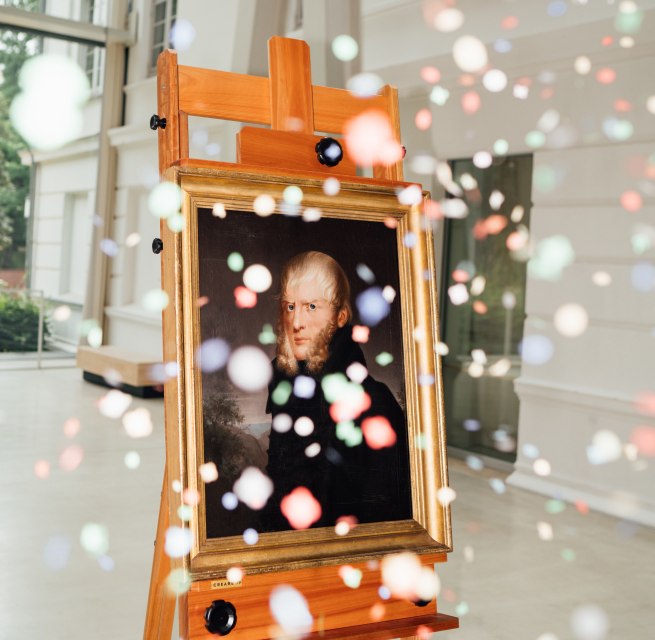 Confetti flies in front of the painting by Caspar David Friedrich - 250 years // 250 years of Caspar David Friedrich - a reason for Greifswald to celebrate this anniversary with many events. // © MV-T/Gross Confetti flies in front of the painting by Caspar David Friedrich - 250 years