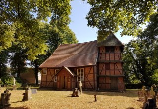 The village church in Matzlow with the characteristic bell tower. // &copy; Foto: Lewitz e.V.