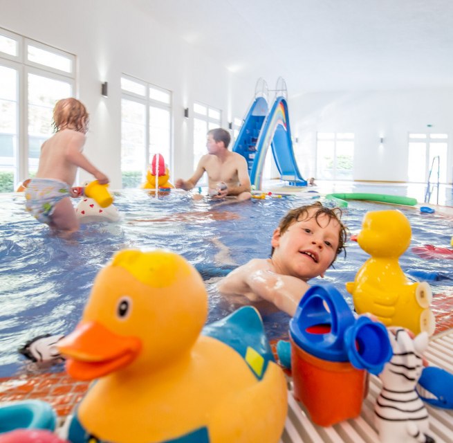 With the water slide, countless squeaking ducks, watering cans, buckets and co. there is always plenty to do in the toddler pool., &copy; Wonnemar Wismar