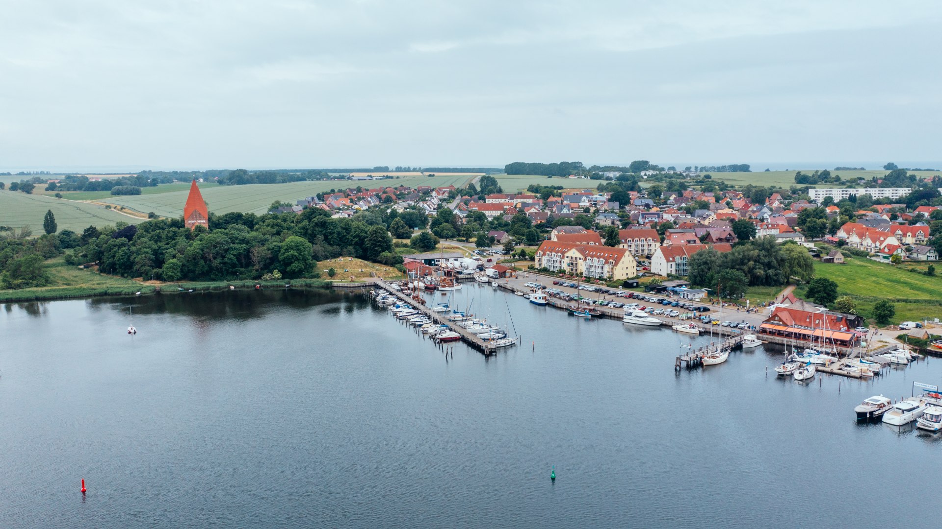 Harbor of Kirchdorf on the island of Poel from the air // Claudia has always dreamed of living by the sea - and often finds plenty of photo opportunities here. // © MV-T/Gänsicke Harbor of Kirchdorf on the island of Poel from the air