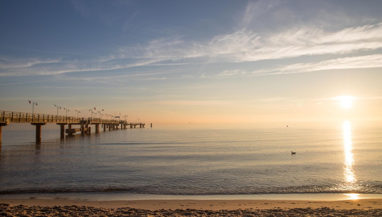 The pier in Baltic resort Goehren - especially impressive at sunrise, © KV Göhren / Stöver