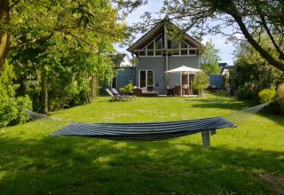 Vacation happiness in the large, fenced garden with 2 terraces - enjoy your vacation! // &copy; Claudia Loer-M&uuml;ller